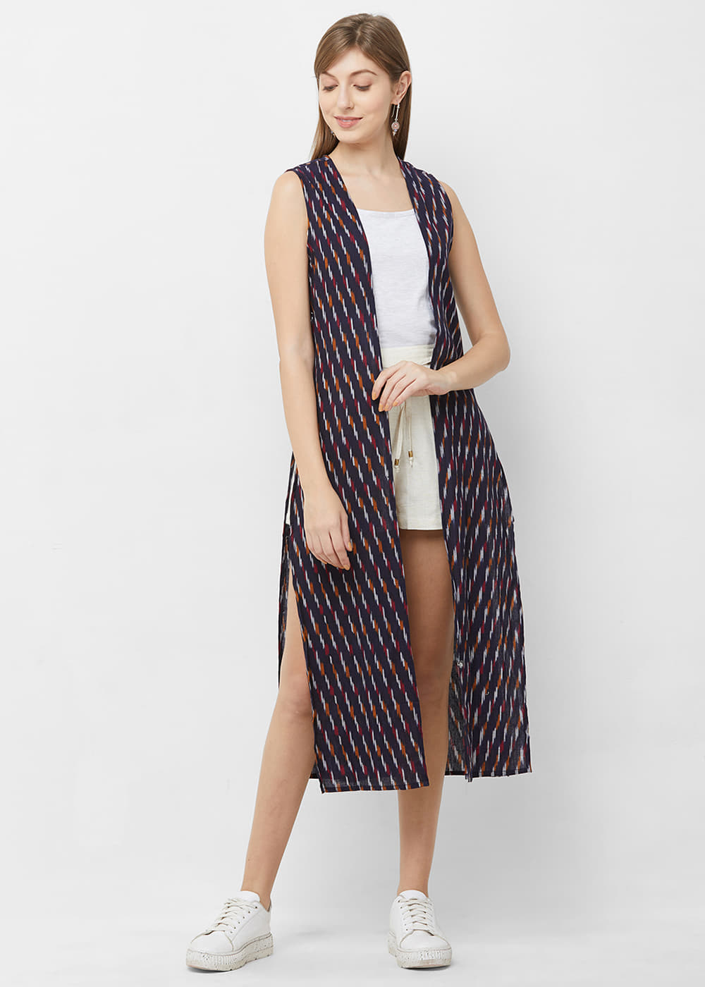 Get Multicoloured Ikat Printed Navy Sleeveless Shrug at ₹ 1080
